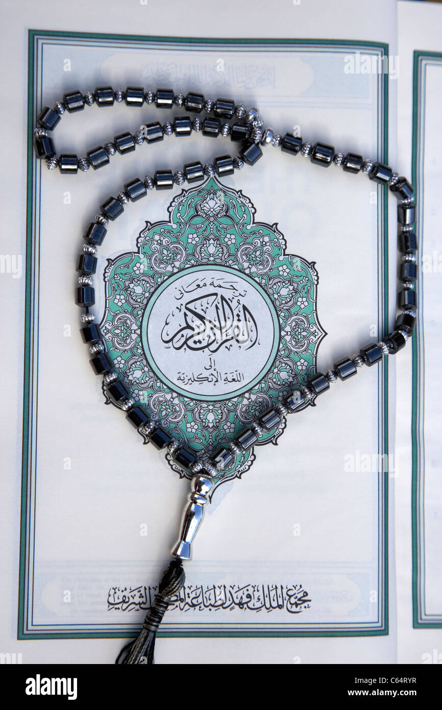 noble holy koran quran with prayer beads Stock Photo