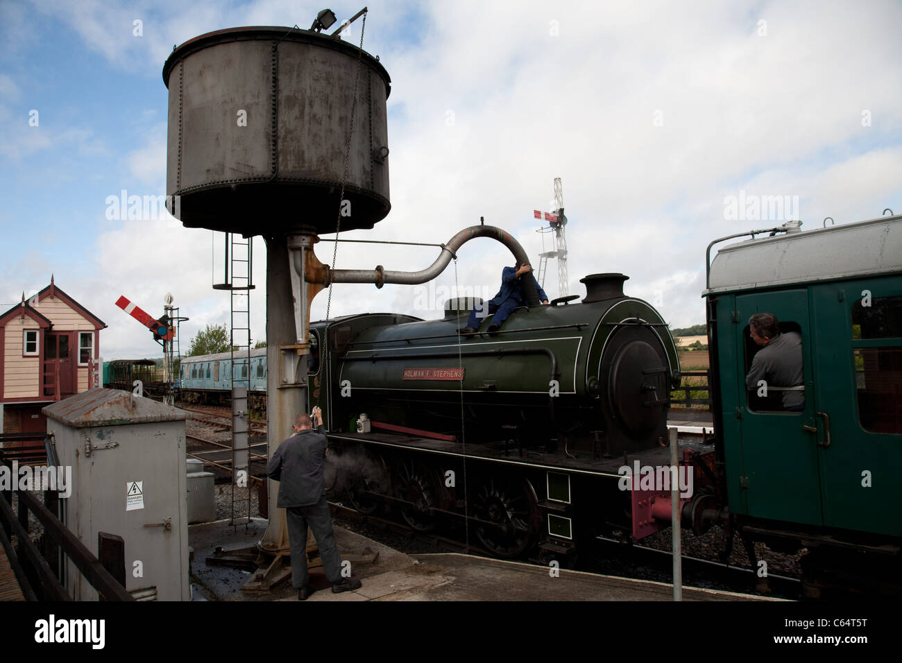 Steam train filling water hires stock photography and images Alamy