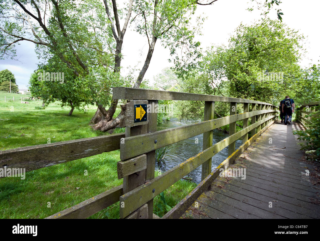 Wooden bridge on the Itchen way walk going from Southampton to Winchester, Hampshire, England, UK Stock Photo