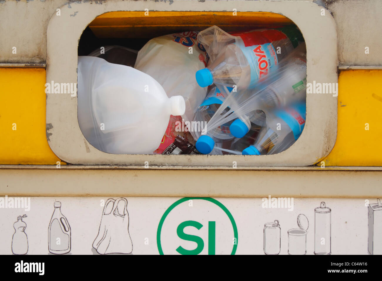 Recycling container for plastic items in street in Spain Stock Photo