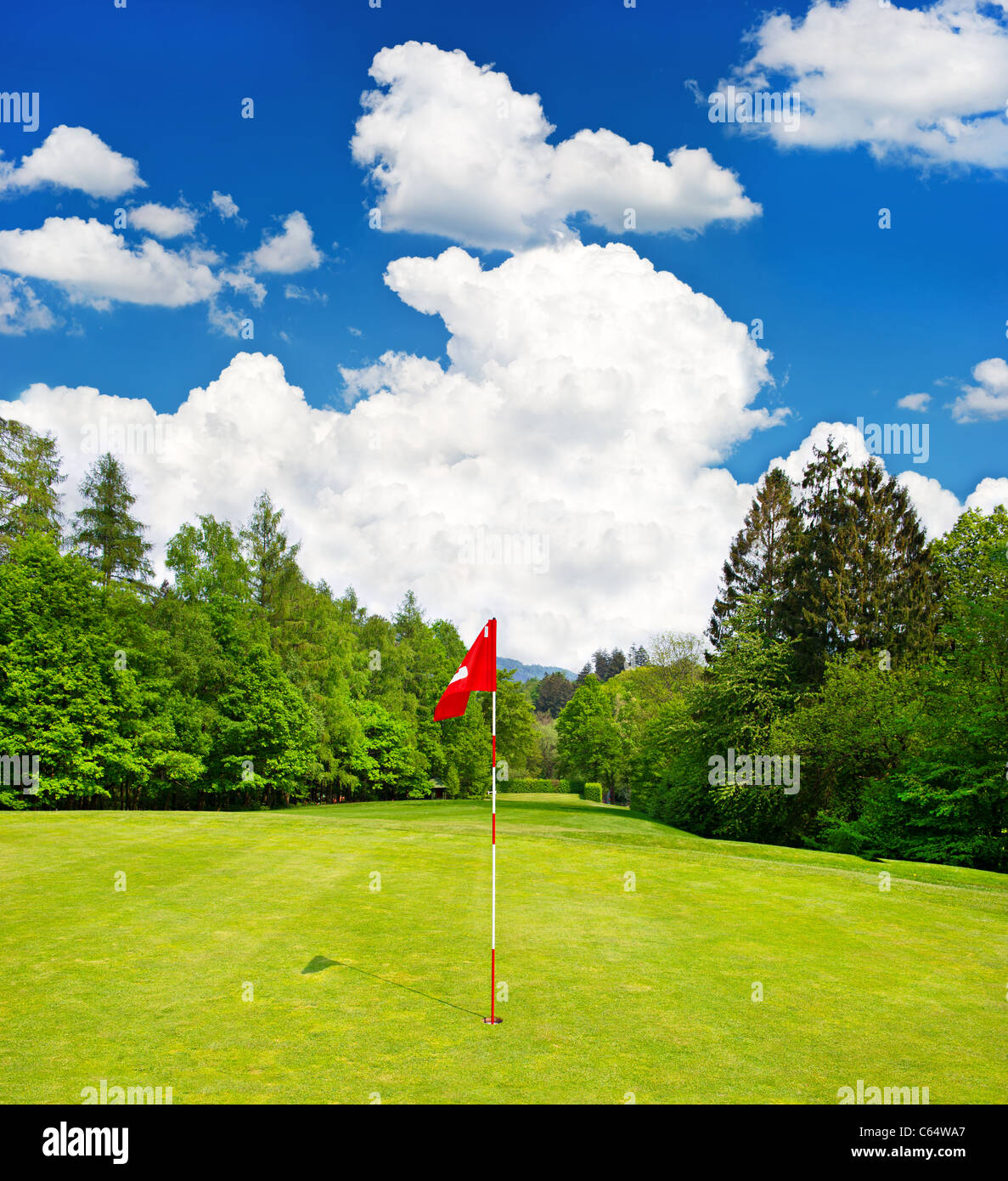 golf field and blue cloudy sky. european landscape Stock Photo