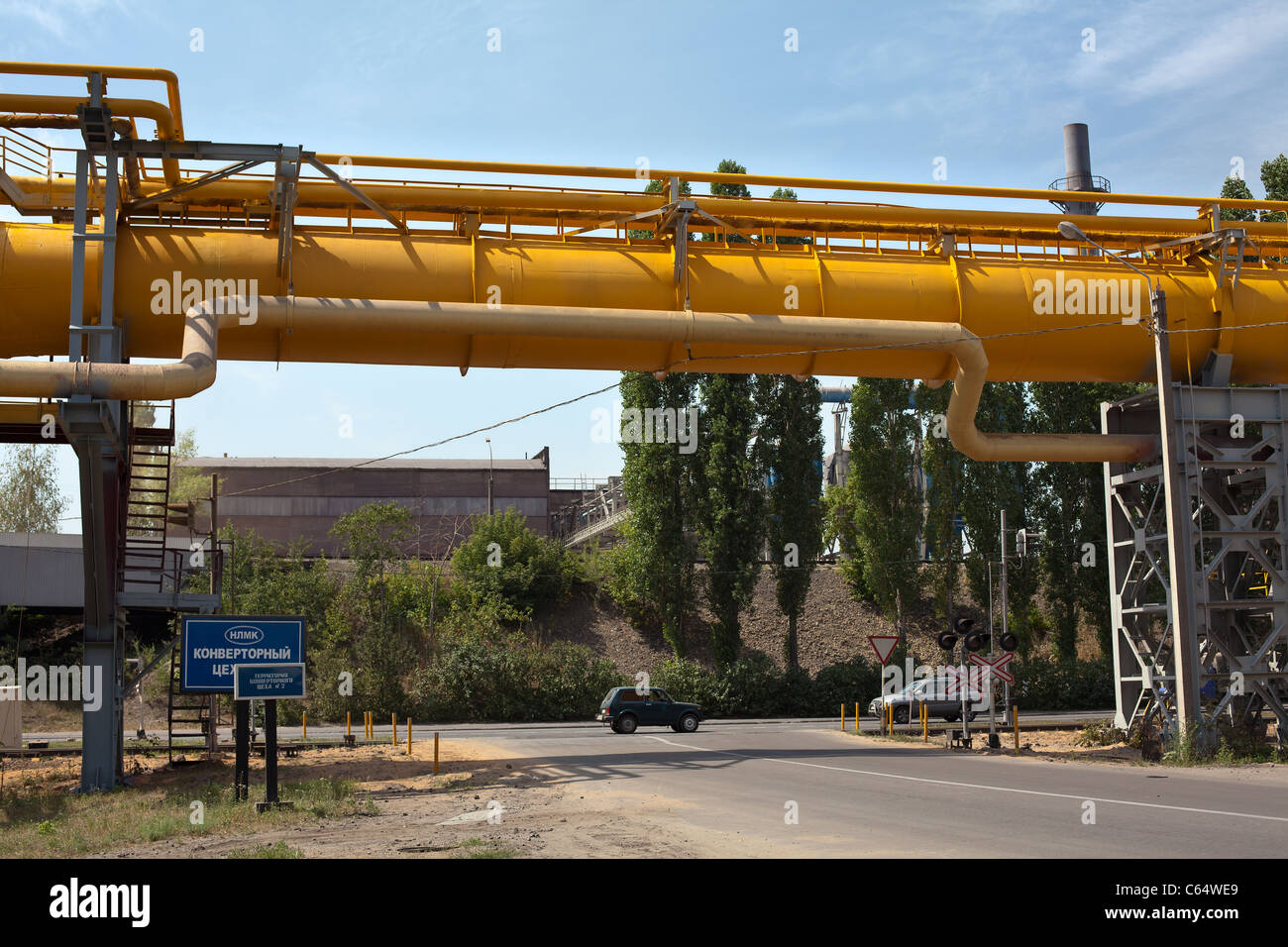 Industrial gas and oil pipelines on metal in a Russian metallurgical plant. Stock Photo
