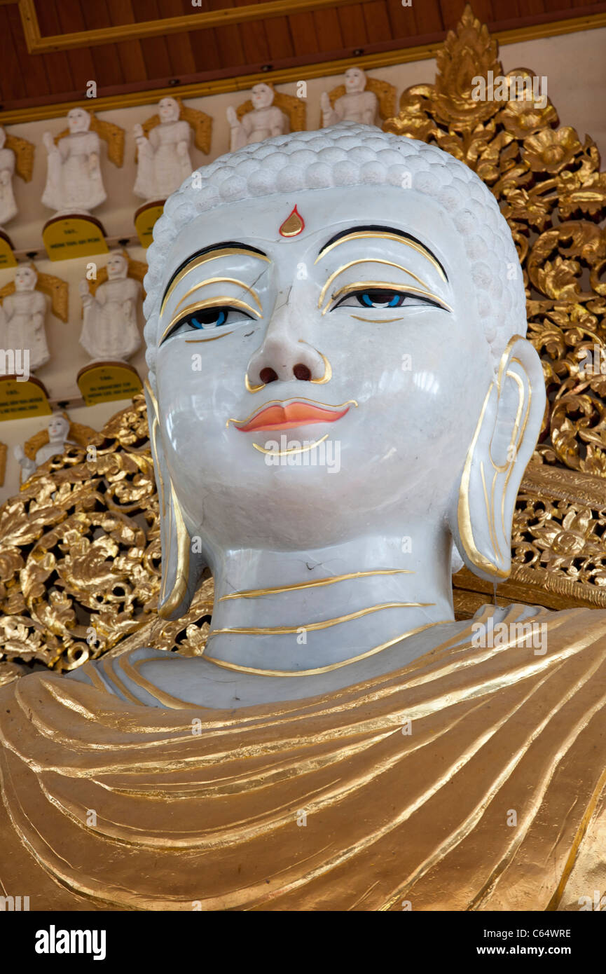 Standing Golden Buddha Statue in Dhammikarama Burmese Temple,