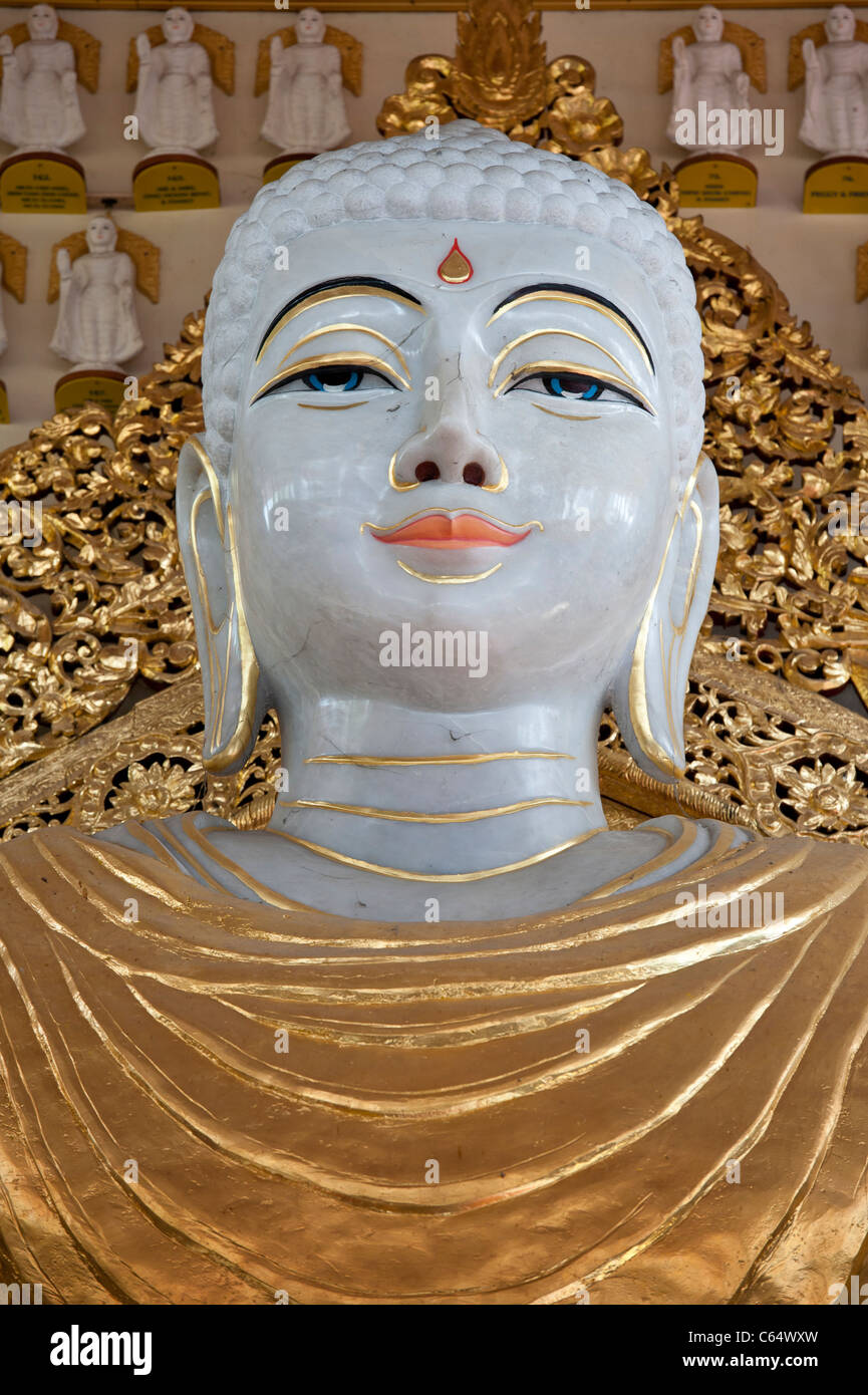 Standing Golden Buddha Statue in Dhammikarama Burmese Temple,