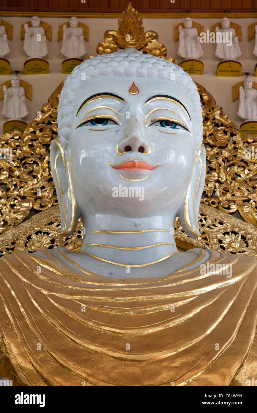 Standing Golden Buddha Statue in Dhammikarama Burmese Temple,