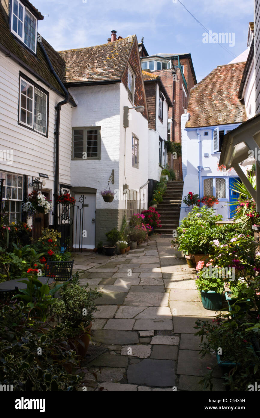 A secluded side street in Hastings, Sussex with pretty terraced cottages. Stock Photo