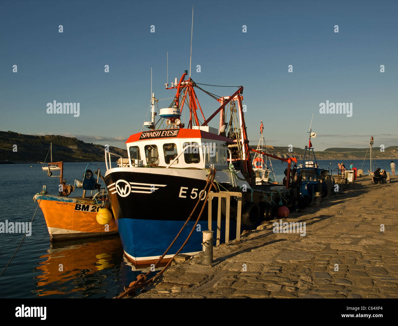 Fishing boats berthed at the end of Victoria Pier Lyme Regis Dorset