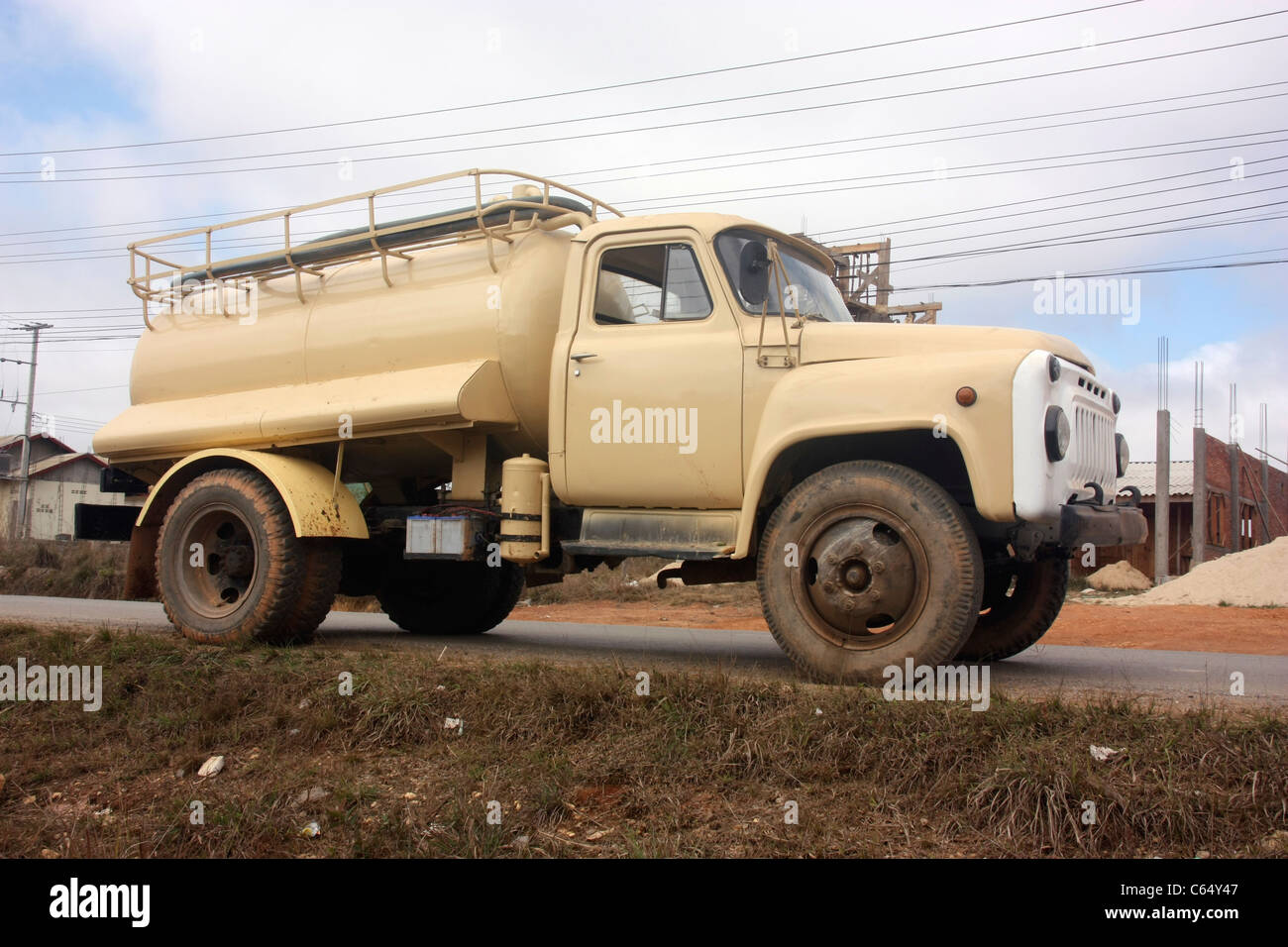 Russian manufactured ZIL130 water truck at a factory in northern Laos Stock Photo