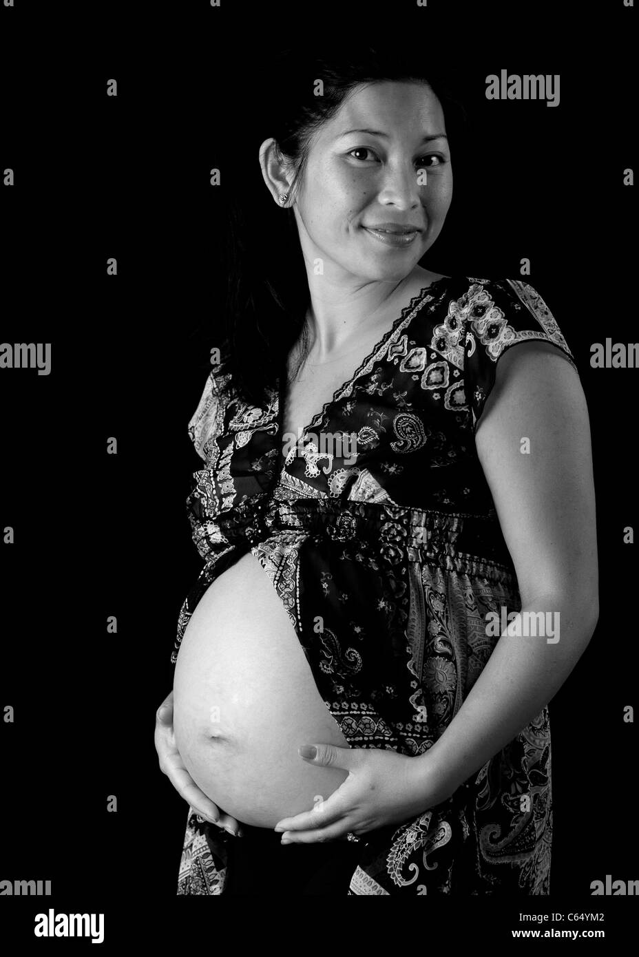 Beautiful pregant Asian woman Stock Photo