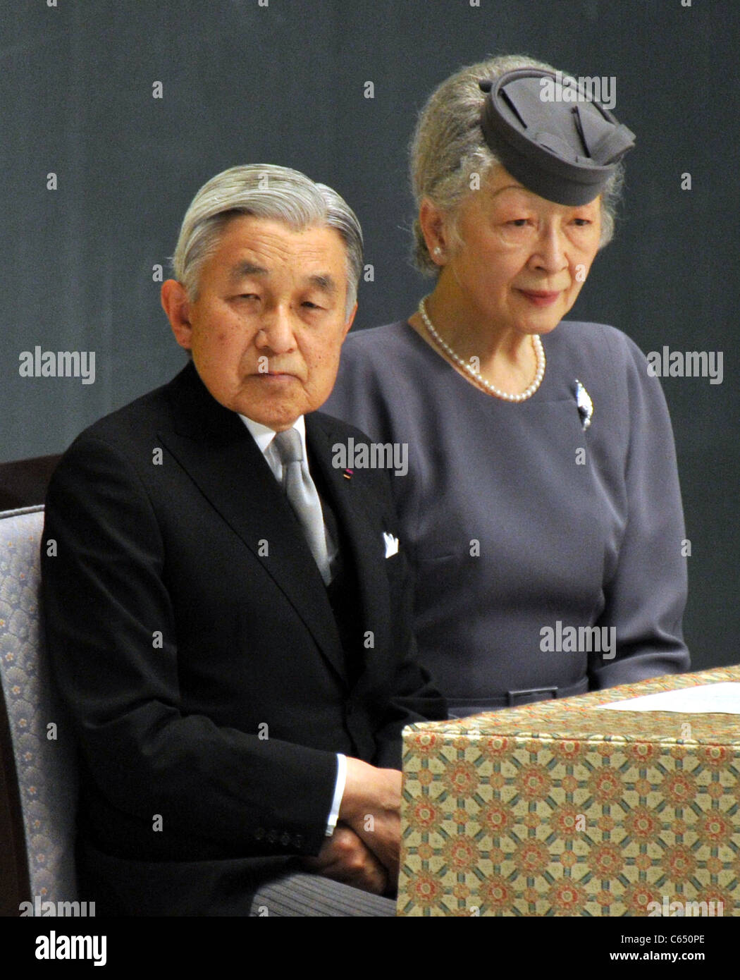 Japan's Emperor Akihito and Empress Michiko offer prayers for the dead and hopes. Stock Photo