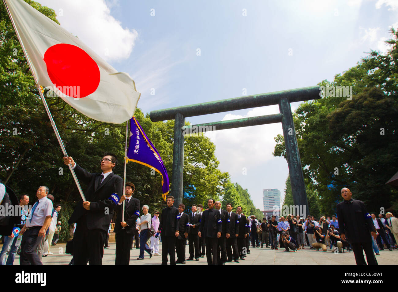 Thousands of people visit Yasukuni Shrine to pay their respect to the Japanese war soldiers who died fighting in World War II. Stock Photo