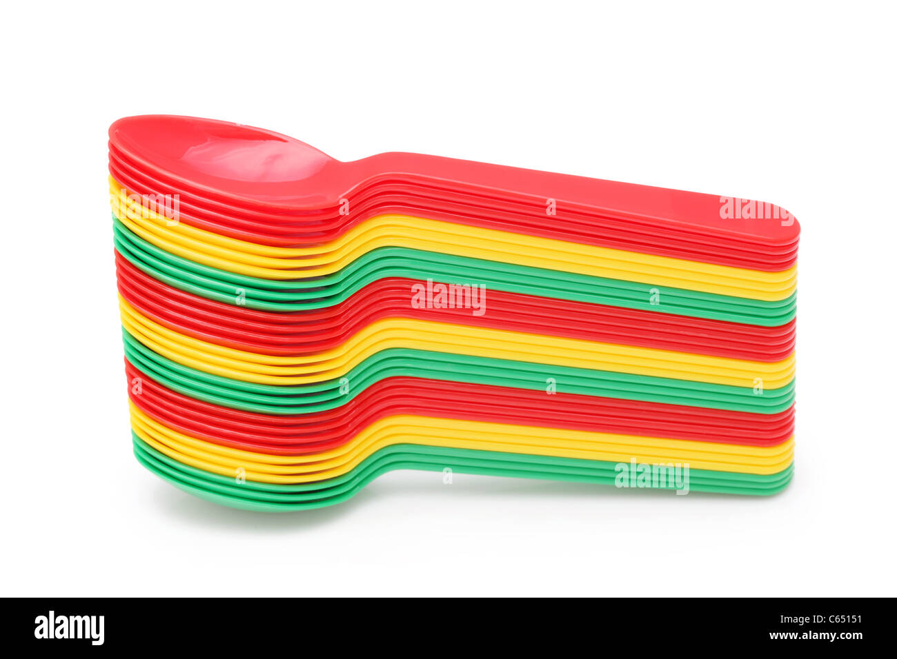 Stack of colorful plastic spoons isolated on white background Stock