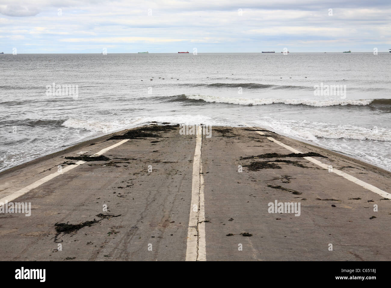 road-into-the-sea-slipway-at-redcar-north-east-england-uk-C6518J.jpg
