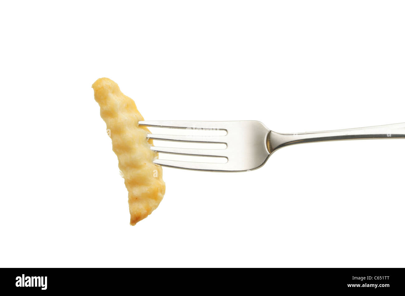 Crinkle cut potato chip on a fork isolated against white Stock Photo