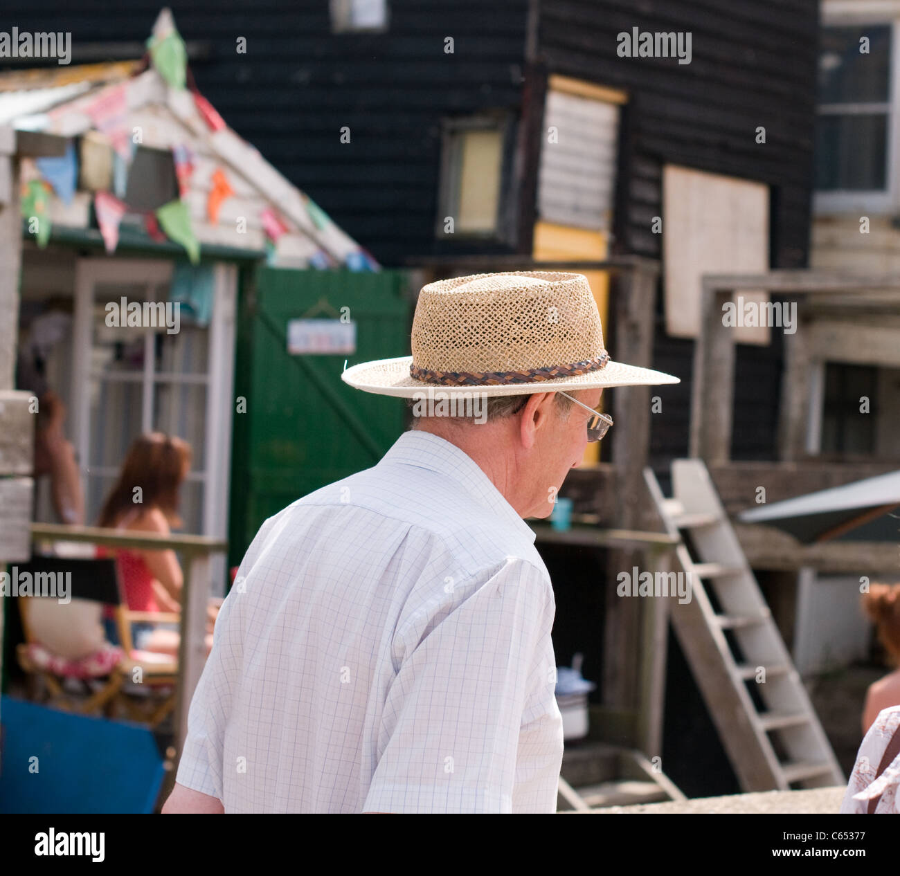 Old man by the seaside in Whitstable, Kent. Stock Photo