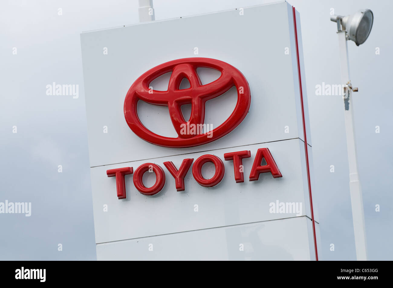 Toyota logo outside of a retail vehicle dealer Stock Photo