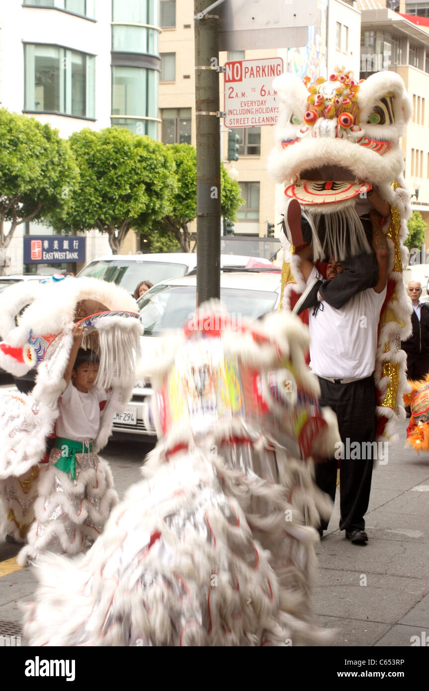 Chinese Dragon Dance performance in Chinatown, San Francisco, California Stock Photo