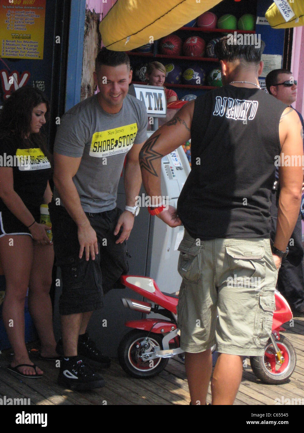 Paul Delvecchio, aka DJ Pauly D, Deena Nicole Cortese, Michael Sorrentino, aka The Situation out and about for JERSEY SHORE Season Two Celebrity Candids - FRI, the boardwalk, Seaside Heights, NJ August 20, 2010. Photo By: Doug Fallone/Everett Collection Stock Photo