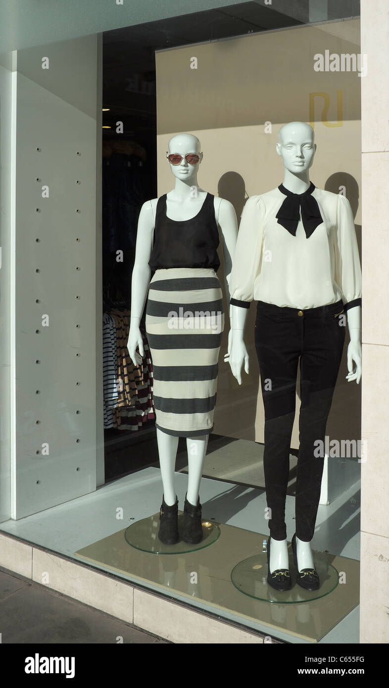 Mannequins in a shop window Stock Photo - Alamy