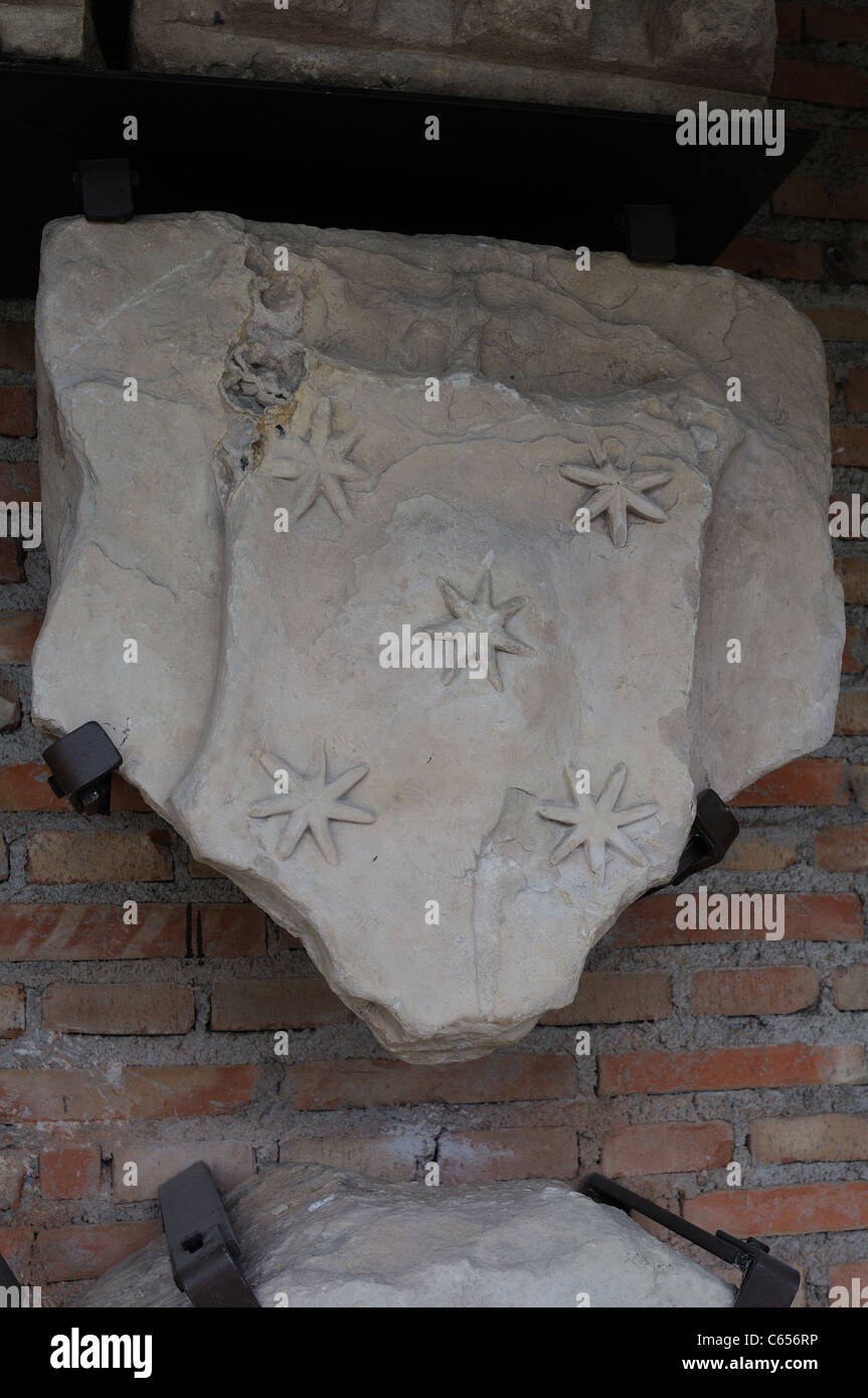 Fonseca Spandrels shield .Renaissance ( Plateresque ) belonging to the ANTIQUARIUM - Wall of ALCALA DE HENARES ( 13 th ).SPAIN Stock Photo