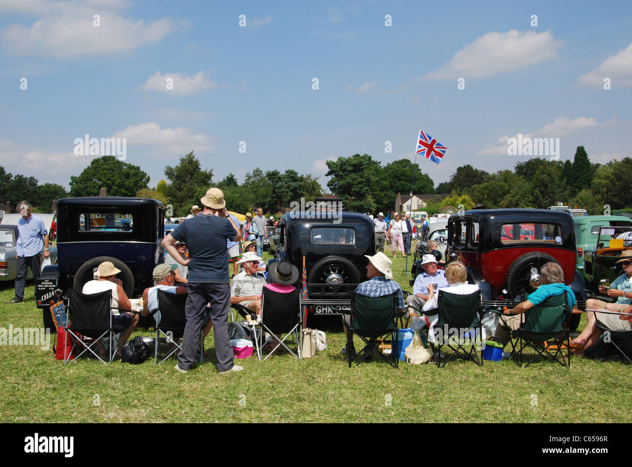 enthusiasts gathering together at classic car meeting United Kingdom Stock Photo
