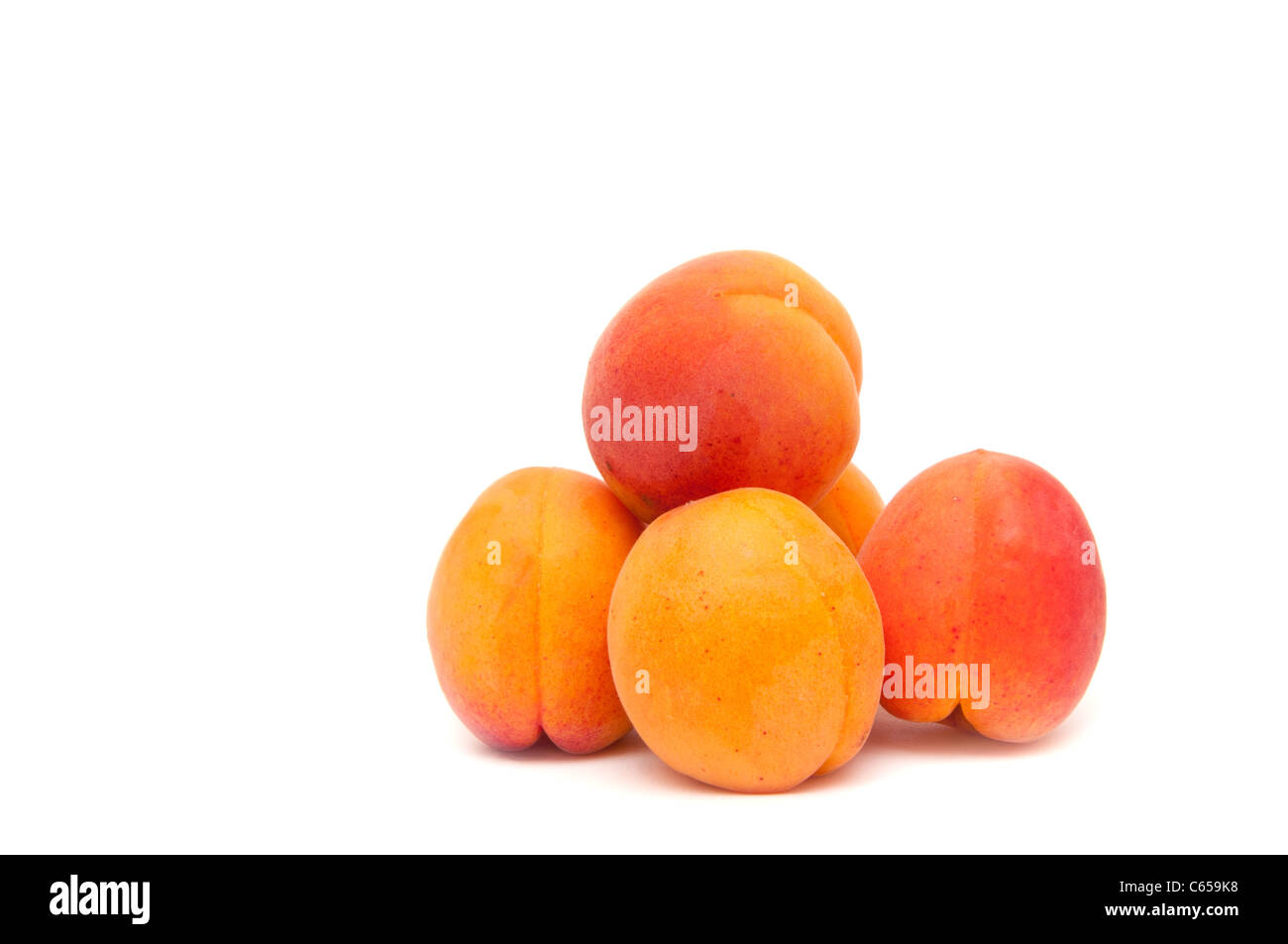 Apricots on the white background Stock Photo Alamy