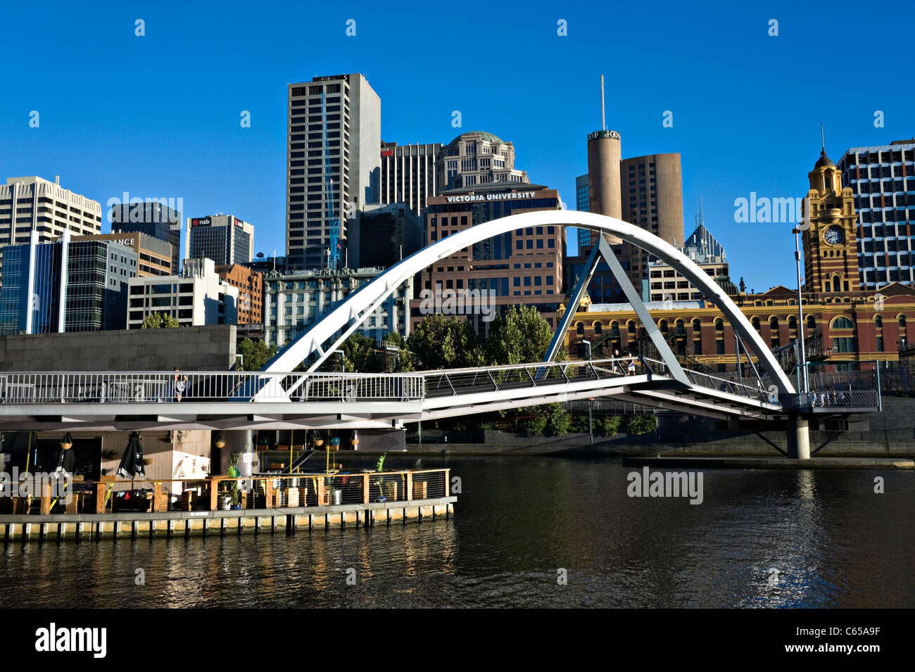 The Yarra Footbridge From Southbank Promenade Across Yarra River to Central Melbourne Business District Victoria Australia Stock Photo