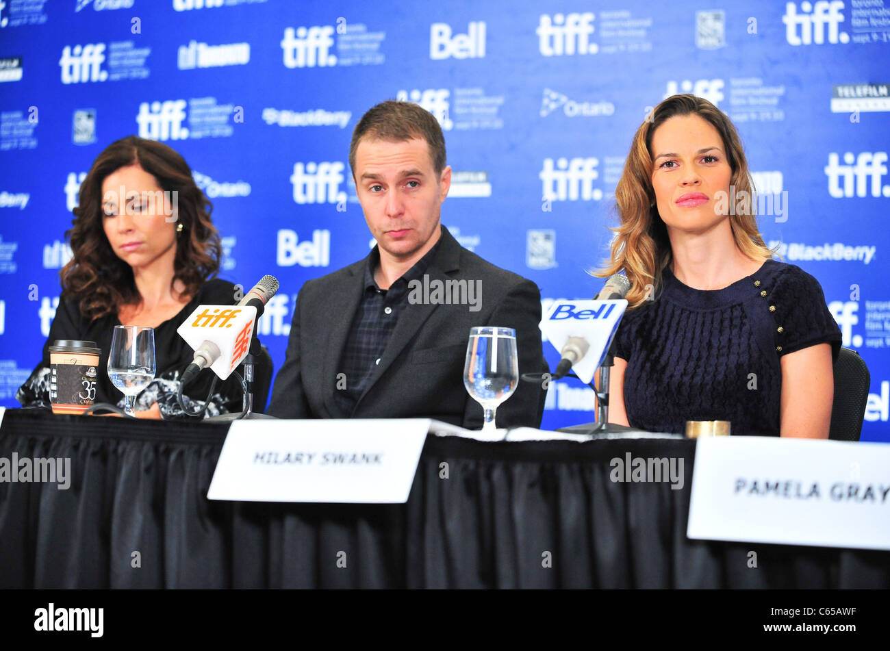 (L-R) Minnie Driver, Sam Rockwell, Hilary Swank at the press conference for CONVICTION Press Conference at Toronto International Film Festival (TIFF), Hyatt Regency Hotel, Toronto, ON September 13, 2010. Photo By: Gregorio T. Binuya/Everett Collection Stock Photo