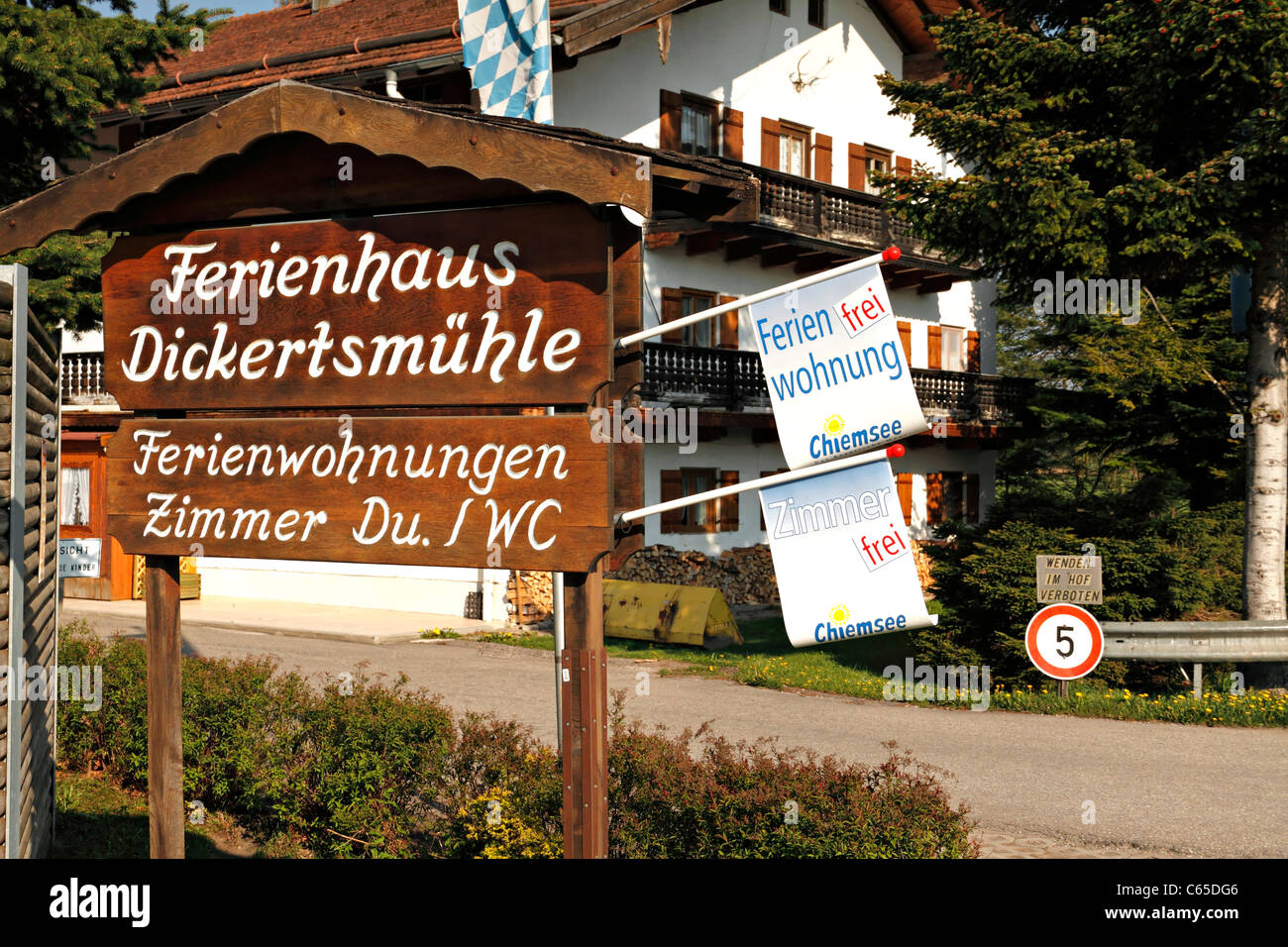 Sign advertising German holiday flats or apartments, Chiemgau Upper Bavaria Germany Stock Photo