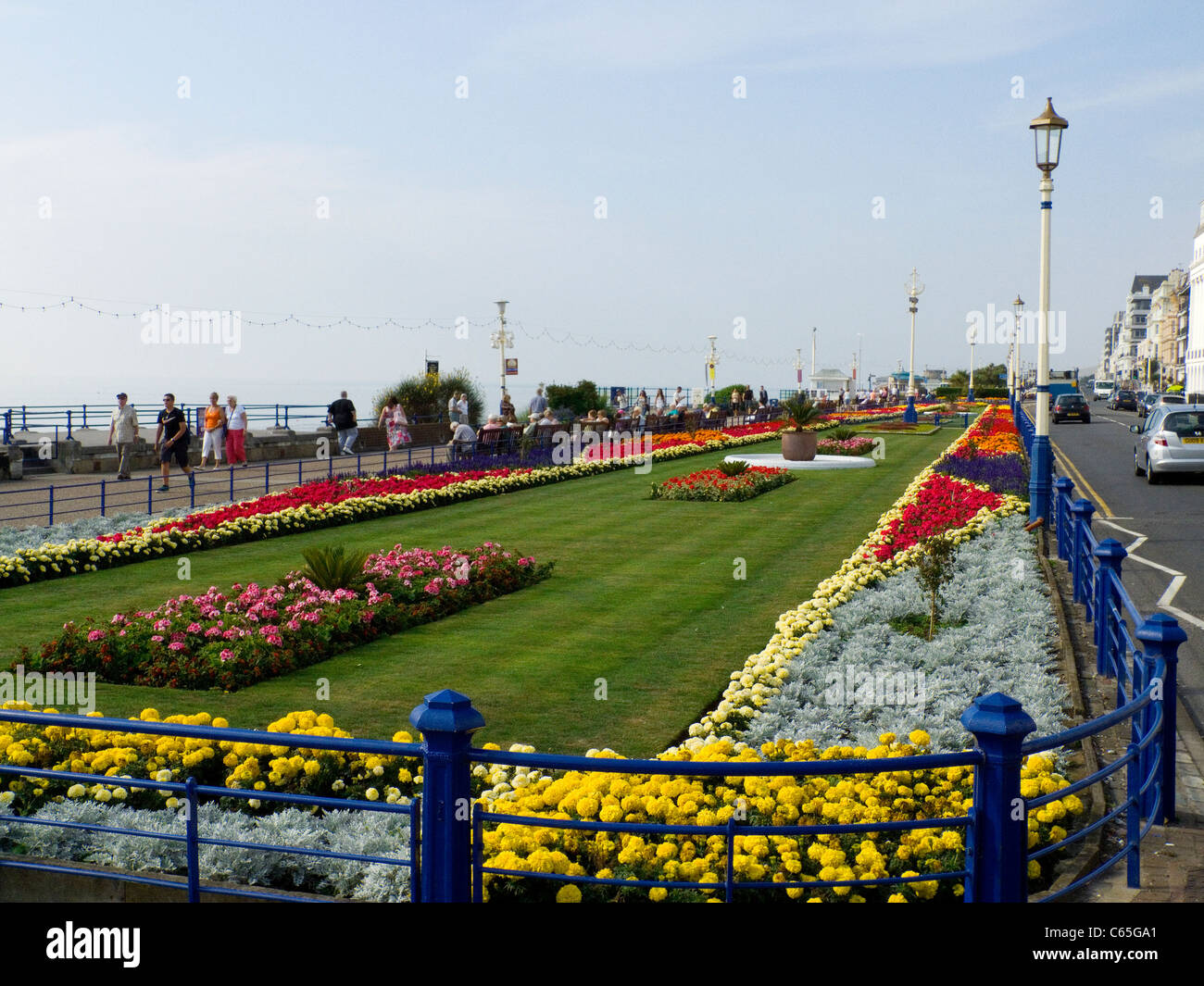 Eastbourne Grand Parade with flower beds in full bloom. Manicured lawns and colourful blooms Stock Photo