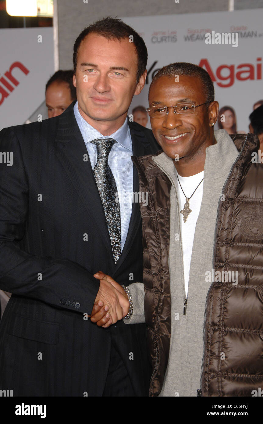 Julian McMahon, Tommy Davidson at arrivals for YOU AGAIN Premiere, El Capitan Theatre, Los Angeles, CA September 22, 2010. Photo By: Michael Germana/Everett Collection Stock Photo