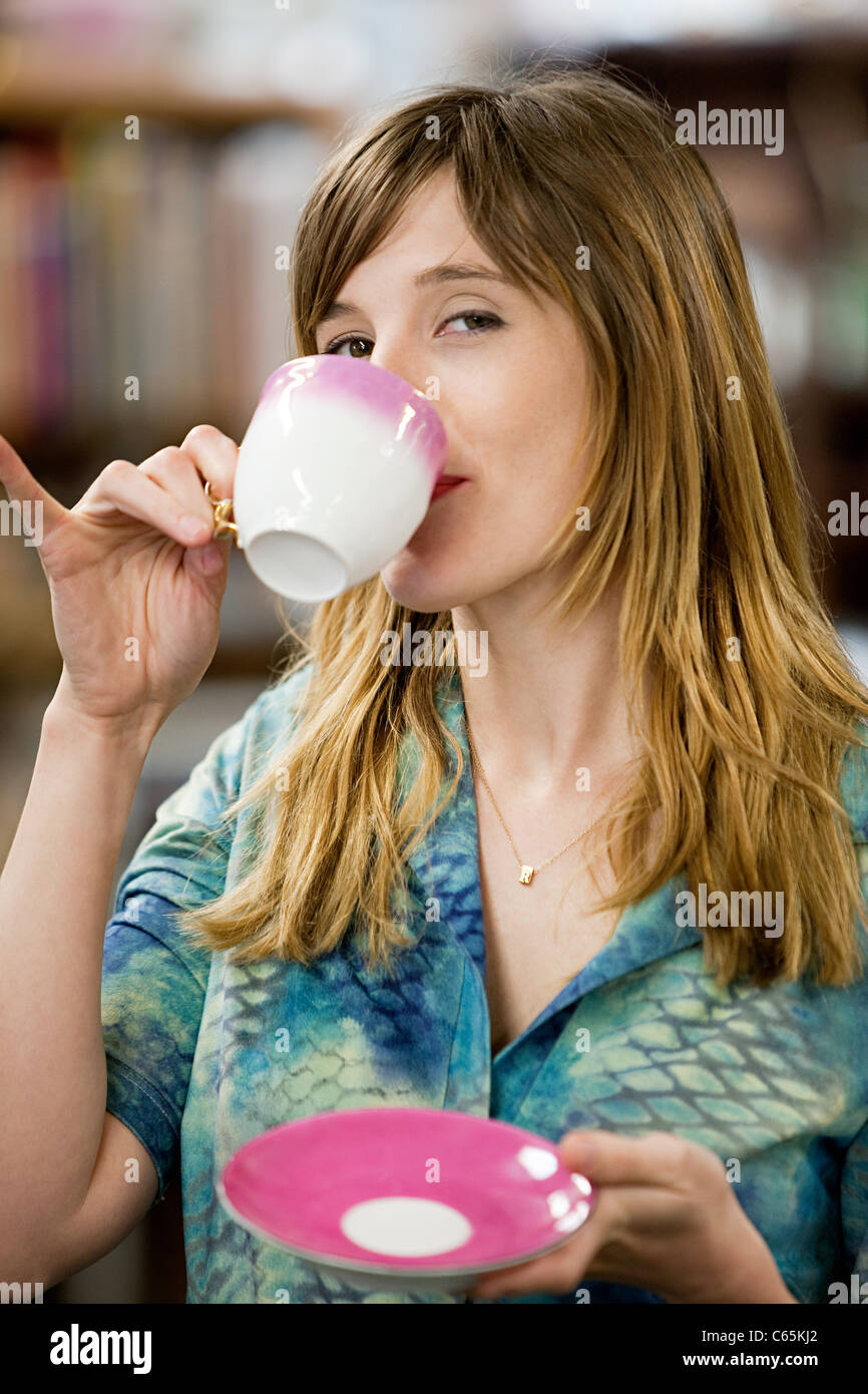 Woman with cup and saucer, portrait Stock Photo