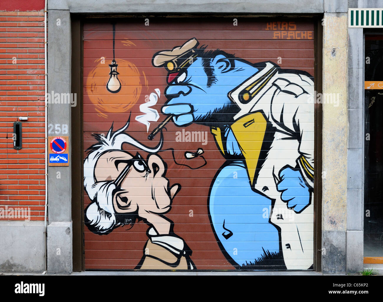 Brussels, Belgium. Graffiti painted on garage door Stock Photo