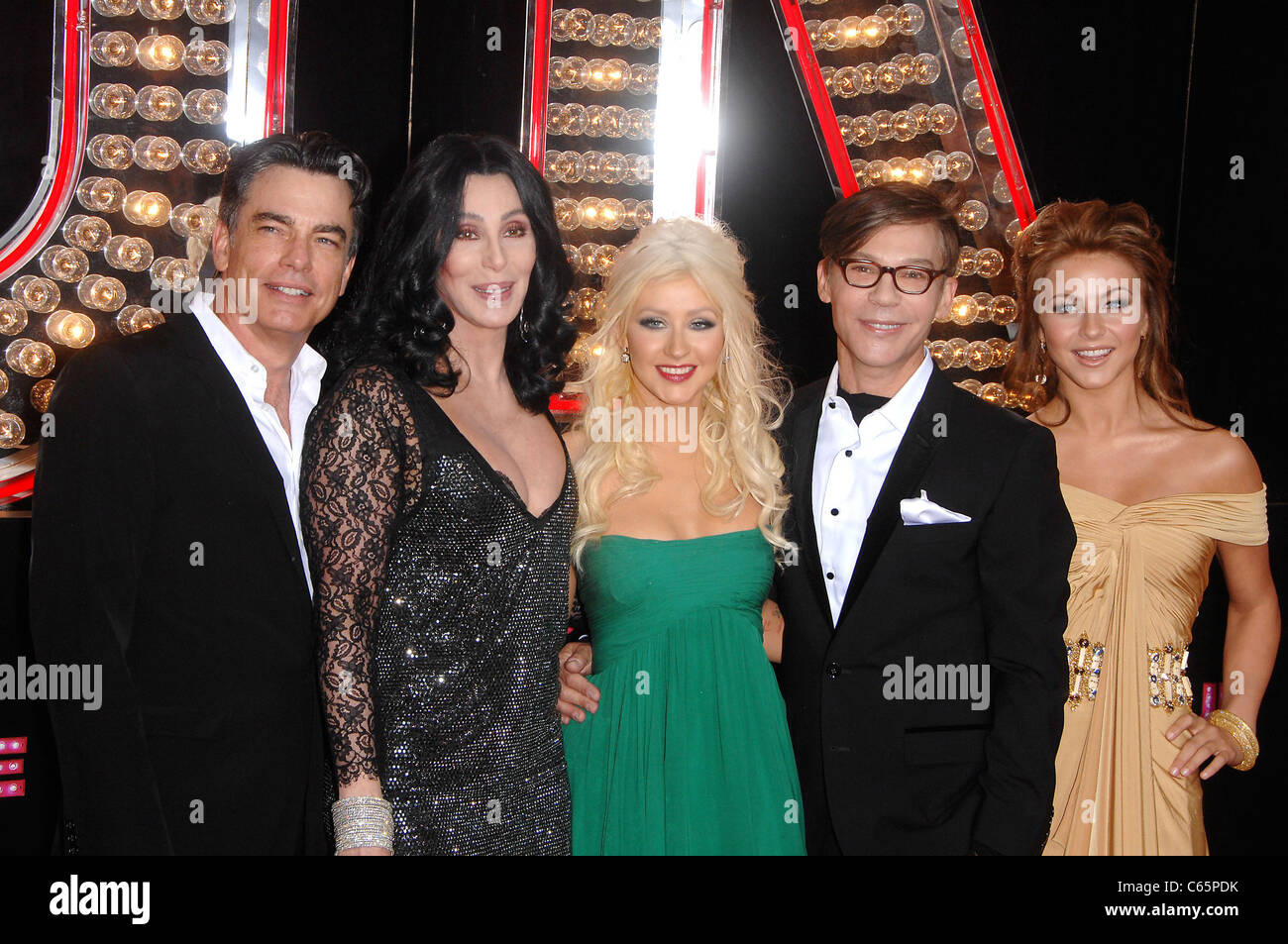Peter Gallagher, Cher, Christina Aguilera, Steven Antin, Julianne Hough at arrivals for BURLESQUE Premiere, Grauman's Chinese Theatre, Los Angeles, CA November 15, 2010. Photo By: Michael Germana/Everett Collection Stock Photo