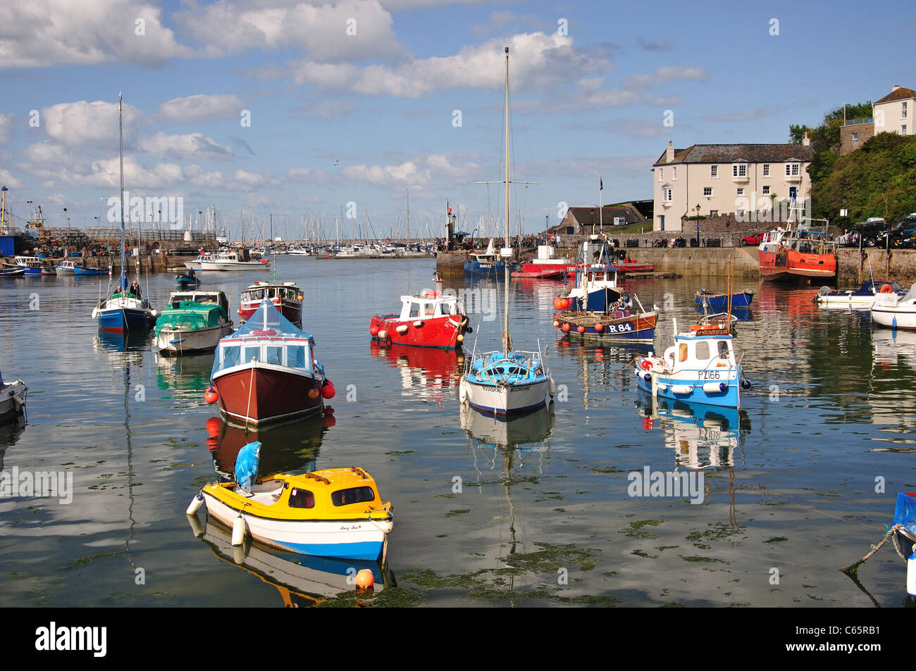 Boats moored in Brixham Harbour, Brixham, Devon, England, United Kingdom Stock Photo