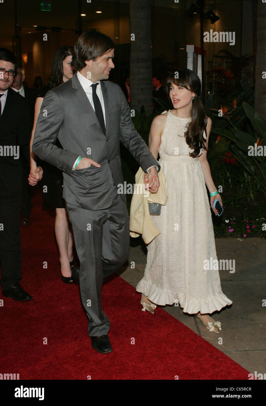 Ben Gibbard, Zooey Deschanel at departures for 68th Annual Golden Globe Awards, Beverly Hilton Hotel, Beverly Hills, CA January Stock Photo