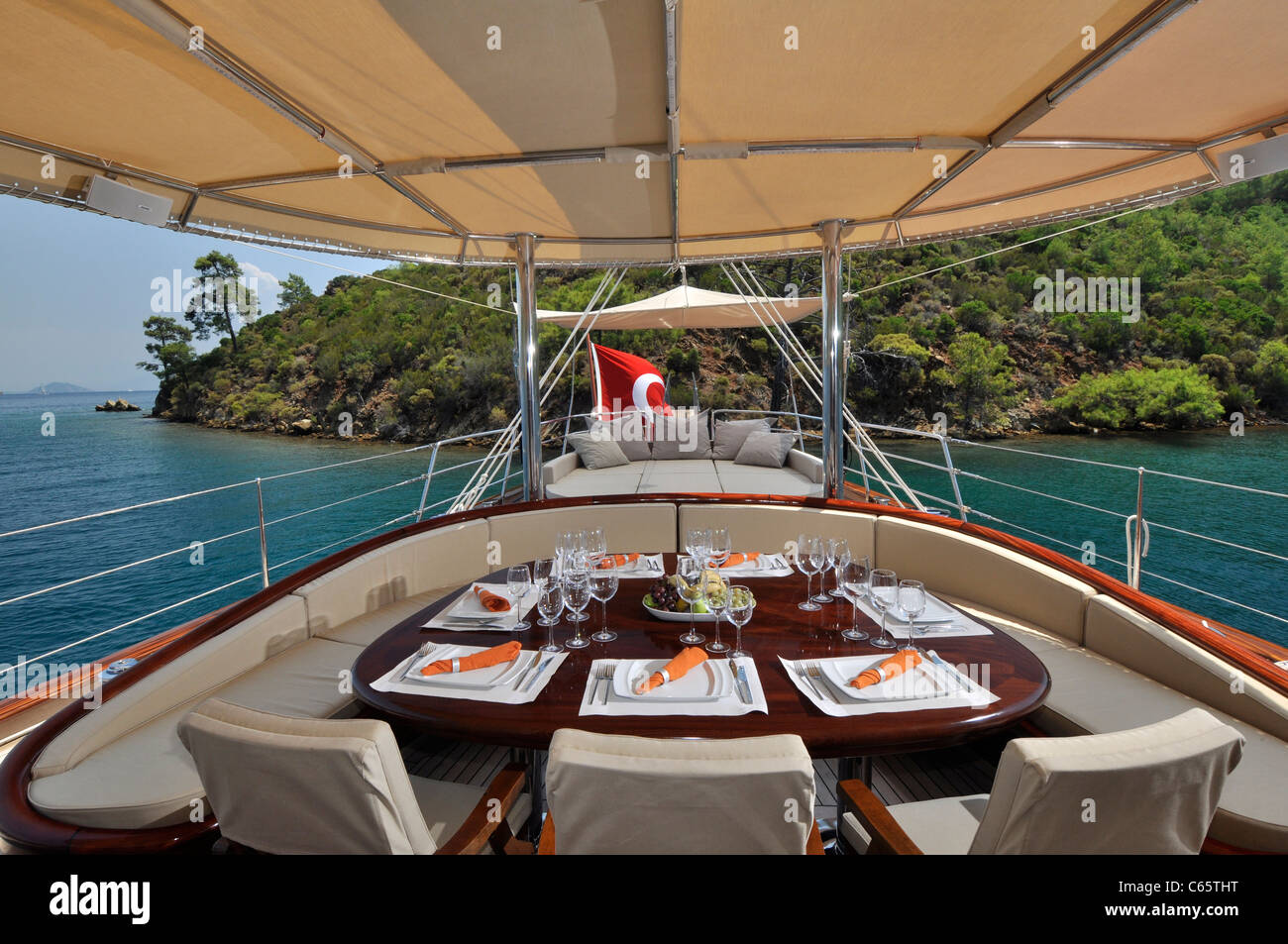 dinner table the deck of luxury sailboat Stock Photo