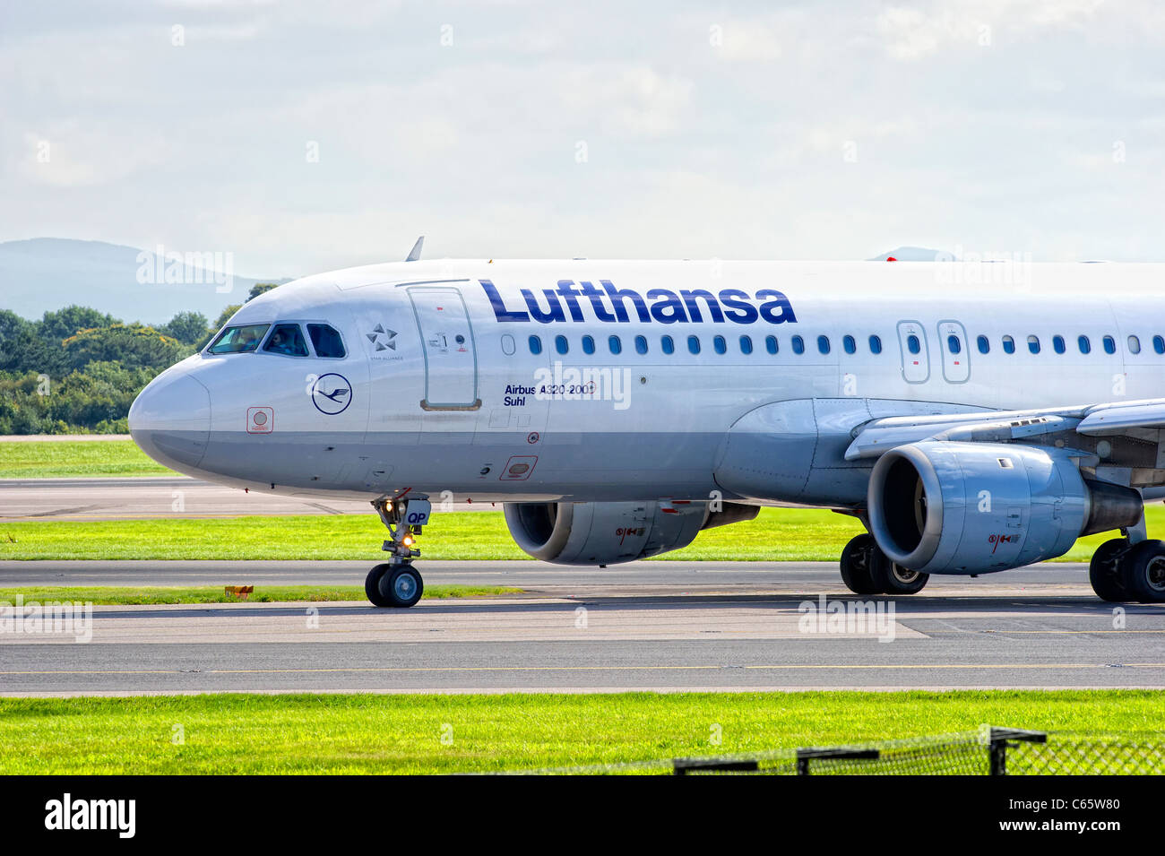 Lufthansa aircraft preparing for take off from Manchester Airport Stock Photo Alamy