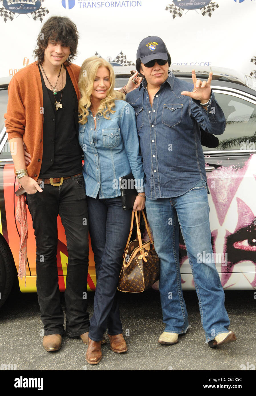 Nick Simmons, Gene Simmons, Shannon Tweed at arrivals for Start Your Engines Brunch for the 2nd Annual Rally for Kids with Cancer Scavenger Cup, The Hollywood Roosevelt Hotel, Los Angeles, CA October 23, 2010. Photo By: Dee Cercone/Everett Collection Stock Photo