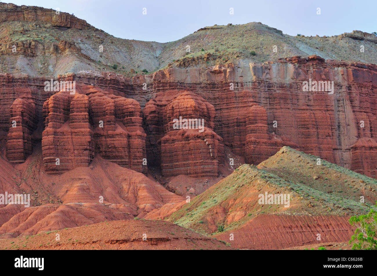 Multicolored sedimentary rock layers and formations are evident in the colorful cliffs of Capitol Reef National Park Stock Photo
