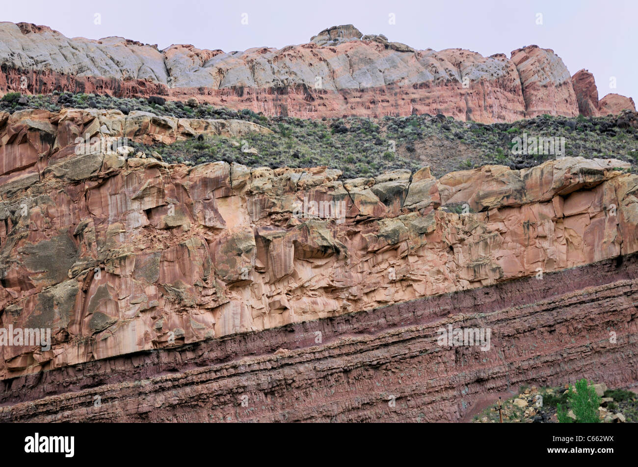 Multicolored sedimentary rock layers are evident in the colorful cliffs of Capitol Reef National Park Stock Photo