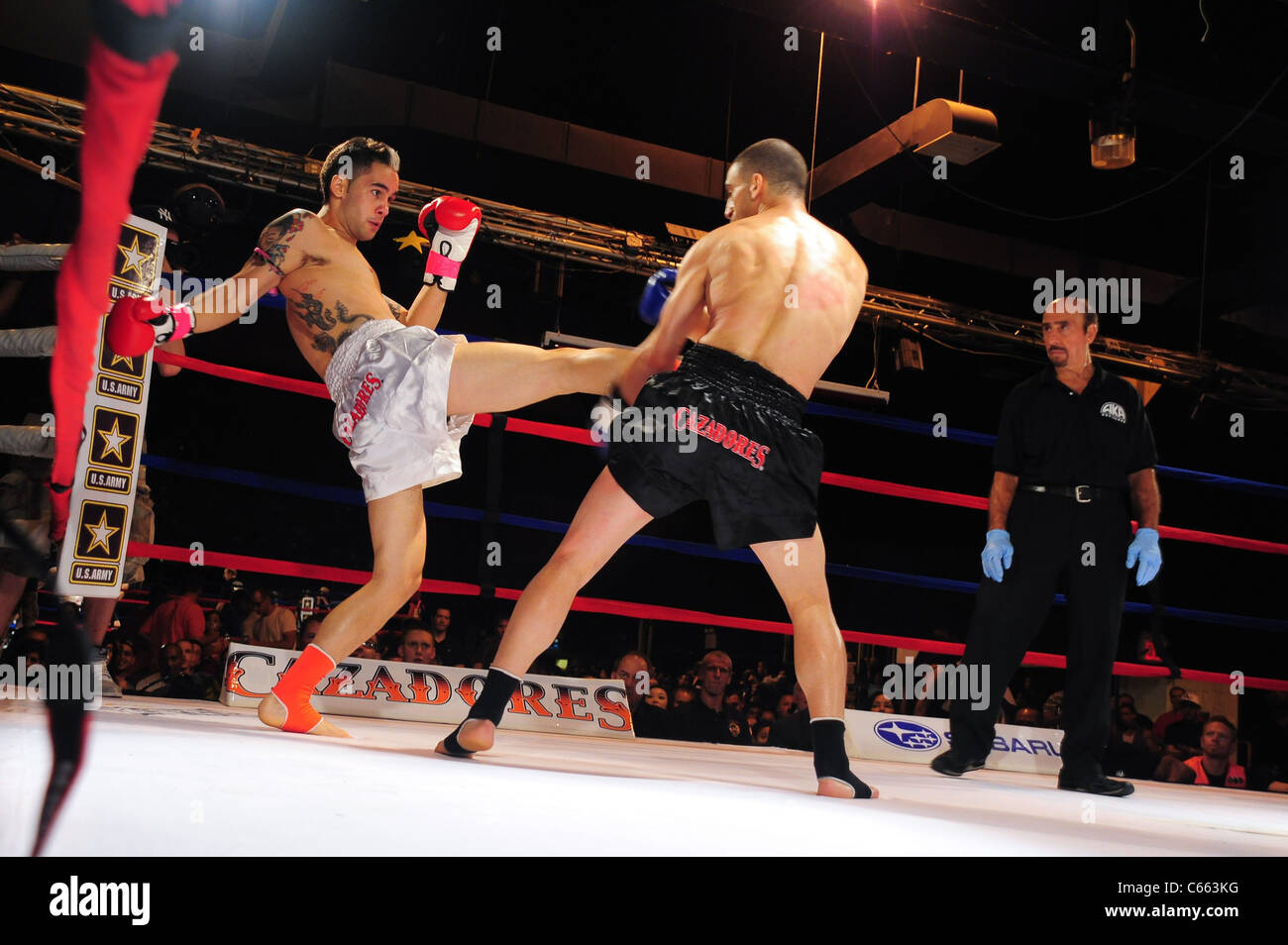 Marc Deluca (white trunks), Omar Ahmed (black trunks) at a public appearance for TAKE ON SHOW Presents $10,000 Professional Muay Thai Kickboxing Tournament, 7 Train Theater, Flushing, NY July 17, 2010. Photo By: Gregorio T. Binuya/Everett Collection Stock Photo