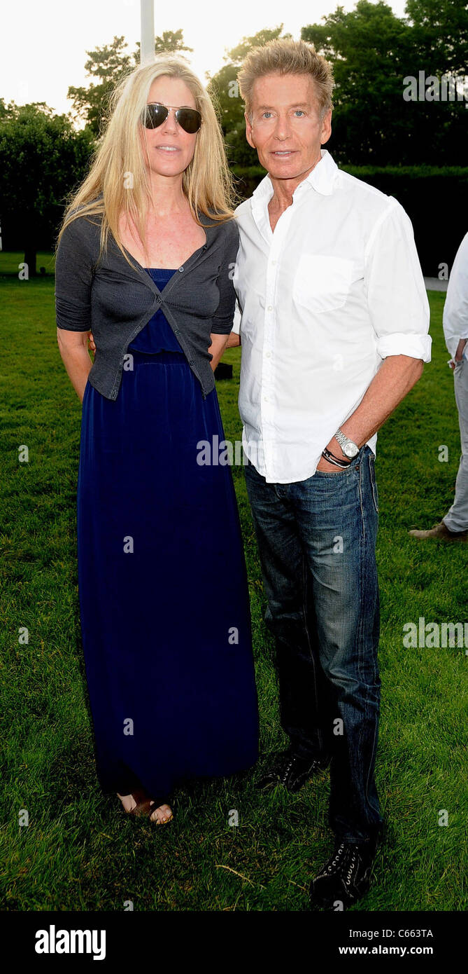 Marci Klein, father Calvin Klein in attendance for 11th Annual Mid Summer Nights Drinks Benefit For Gods Love We Deliver, Home of Jeff Pfeifle, Water Mill, NY June 18, 2011. Photo By: Rob Rich/Everett Collection Stock Photo