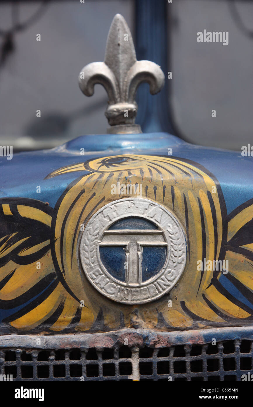 Close up of cowl badge and paintwork on 1960s vintage Tata 1210 SE truck in West Bengal, India Stock Photo