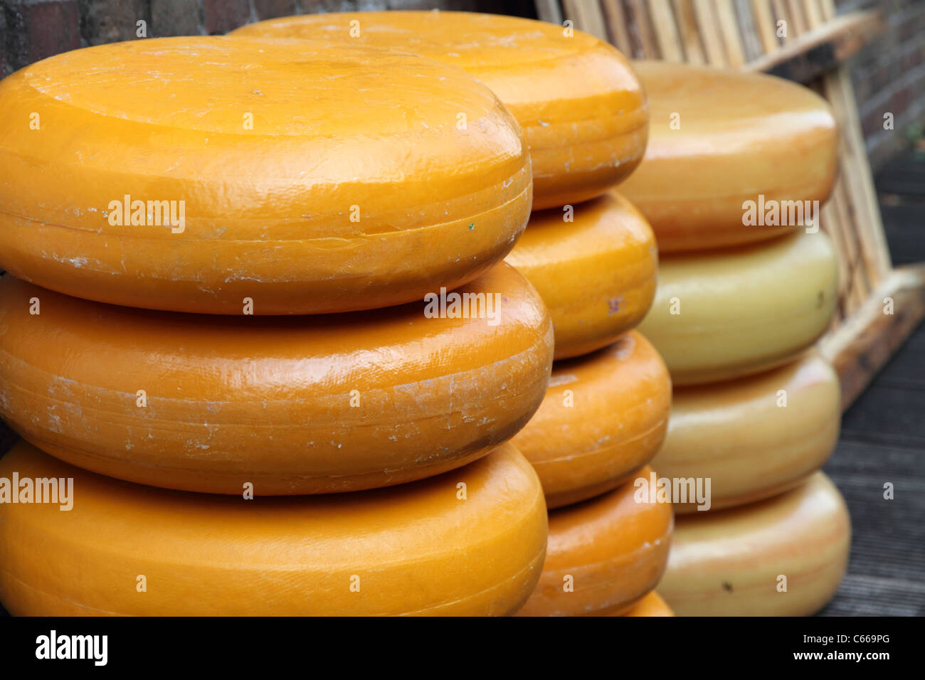 Pile of cheese in Gouda harbor, The Netherlands Stock Photo