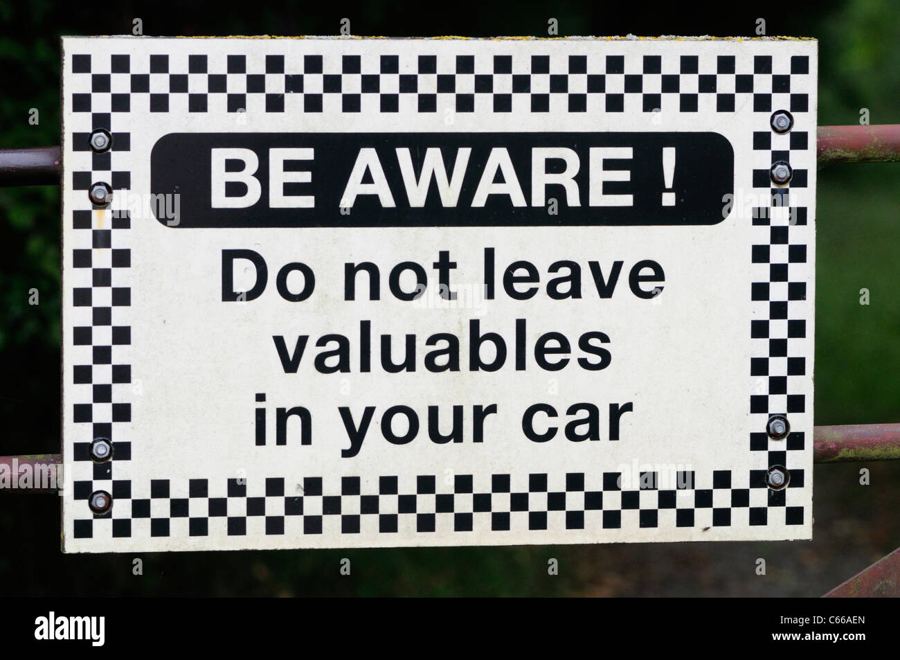 Be Aware Do Not Leave Valuables in Your Car Warning Sign outside Fowlmere RSPB Reserve, Cambridgeshire, England, UK Stock Photo
