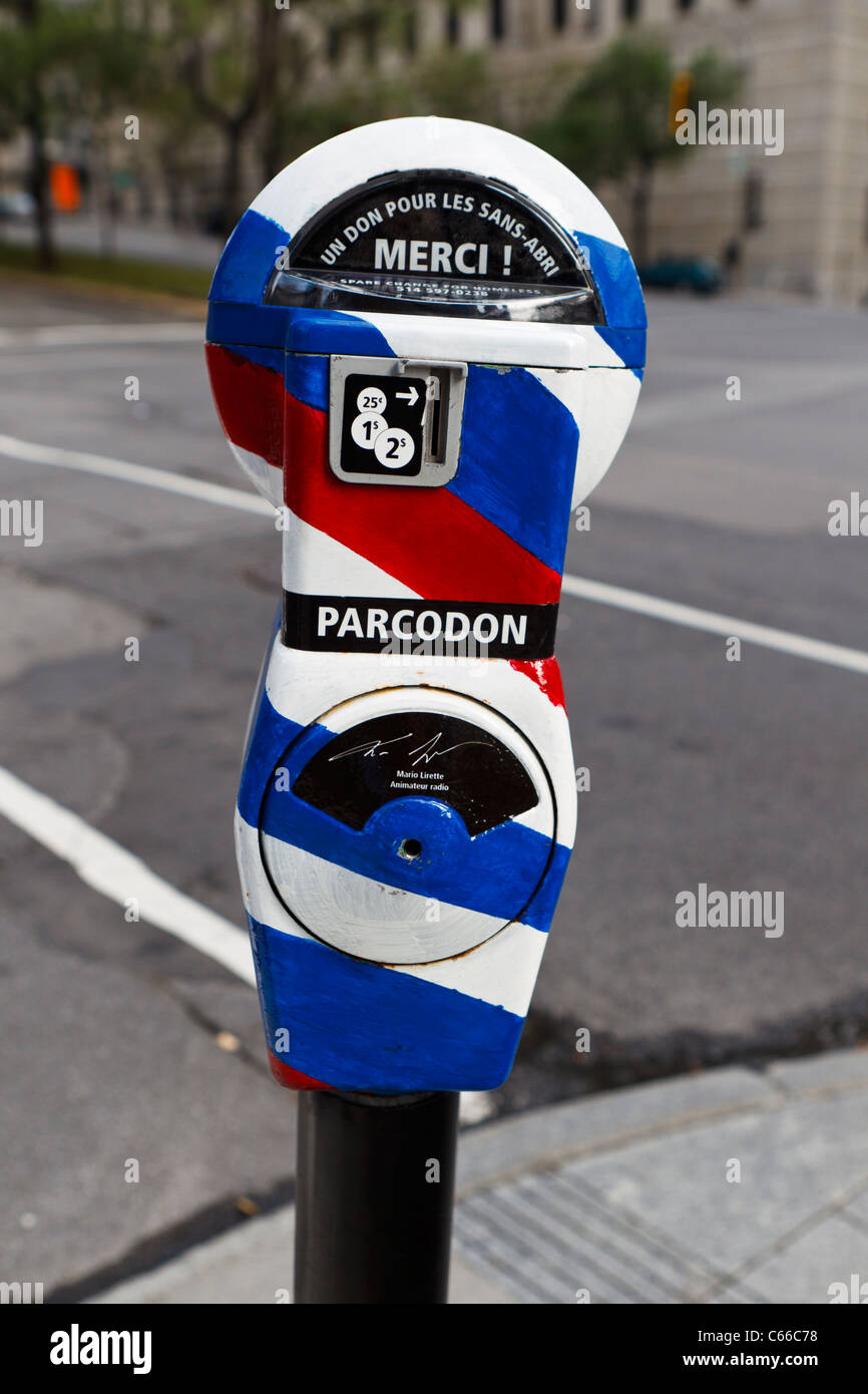 Parking meter in French with red white and blue stripes, Centre Ville, downtown, Montreal