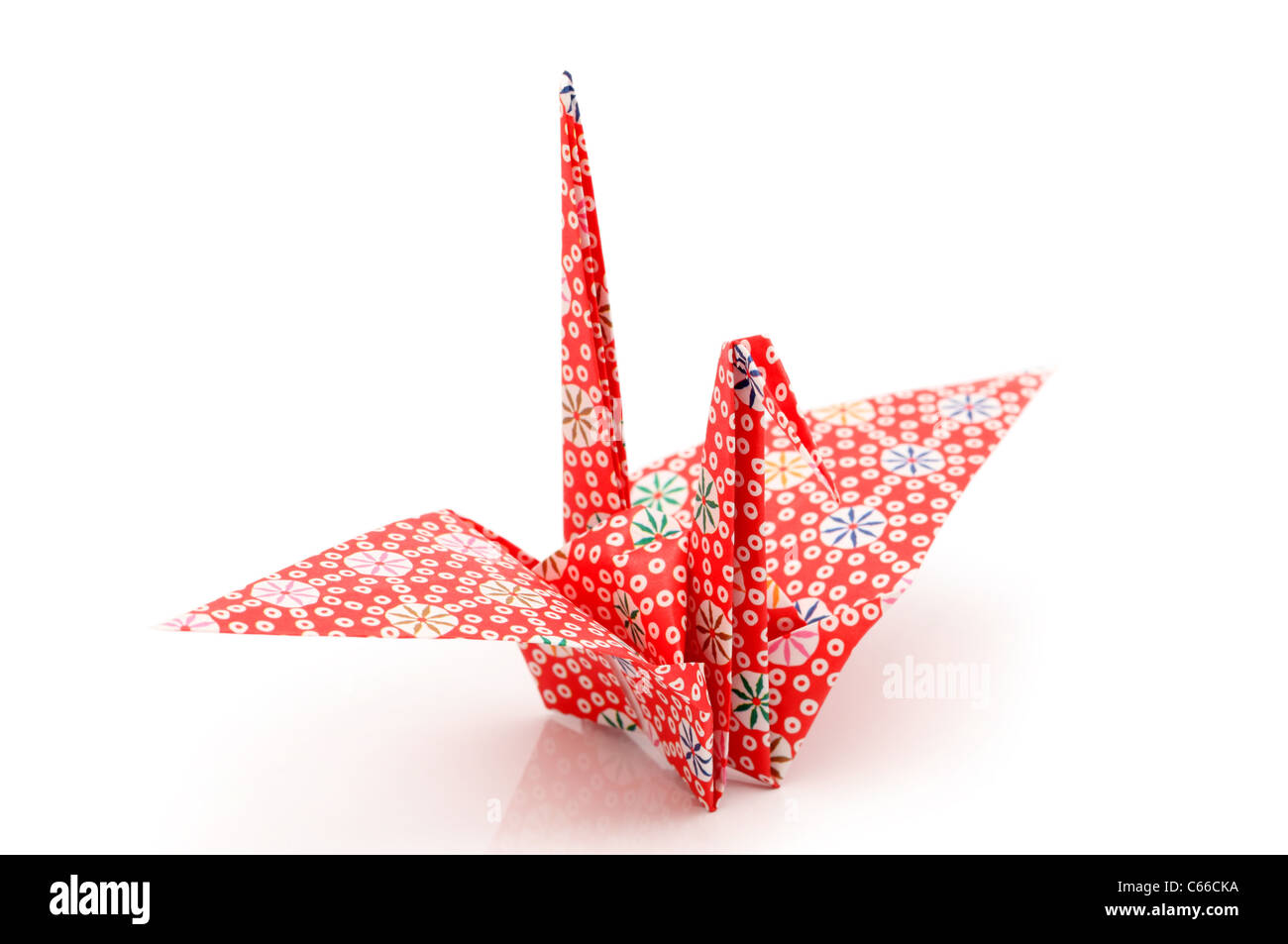 Origami crane isolated on white background Stock Photo