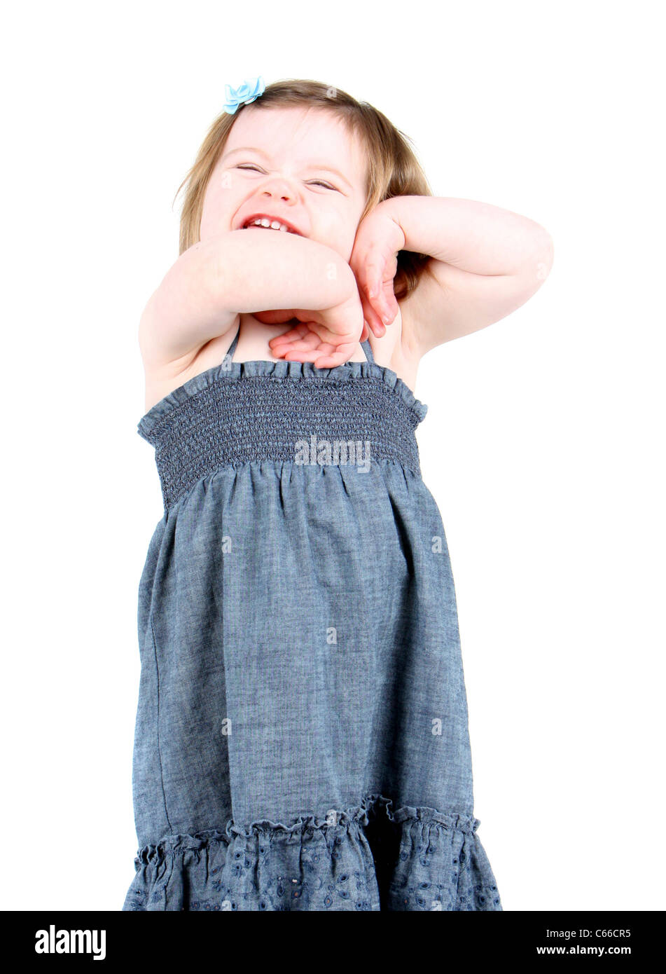 Adorable little girl with hands on her face Stock Photo - Alamy