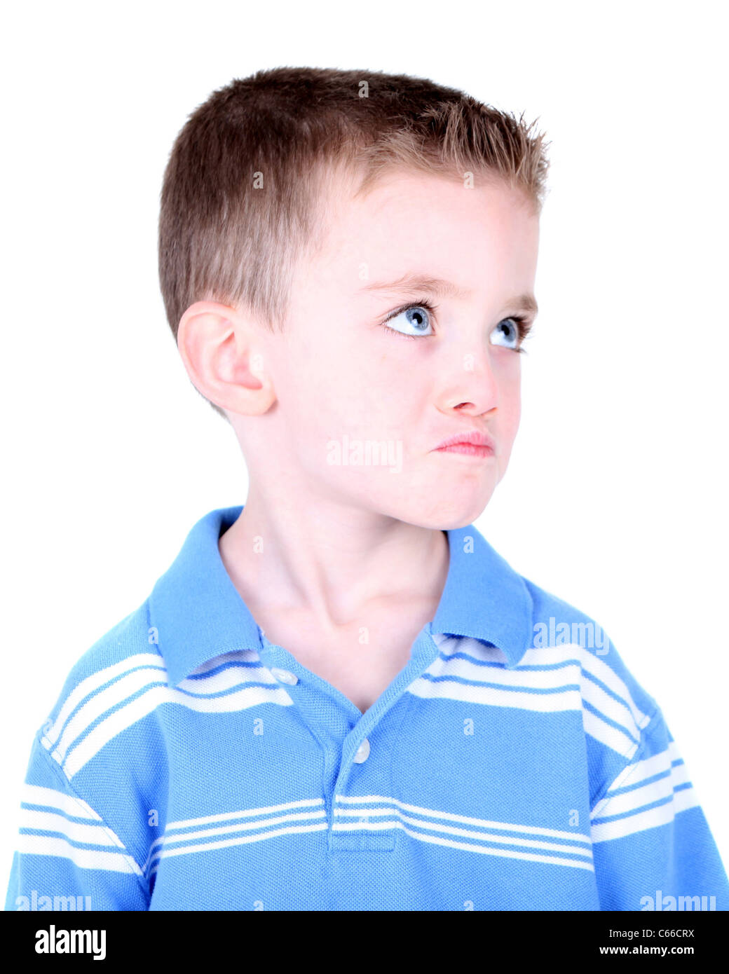 Young boy with pout Stock Photo - Alamy